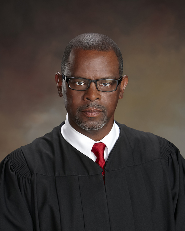 Portrait of Speaker Name